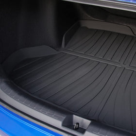 powoq trunk mat liquid spill test showing easy wipe-clean benefit