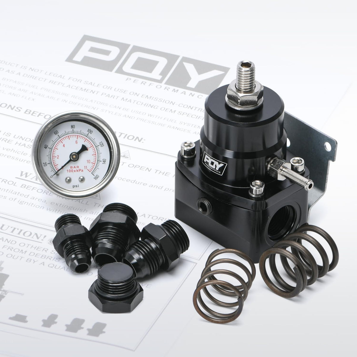 PQY regulator held in hand for scale showing compact size and robust construction