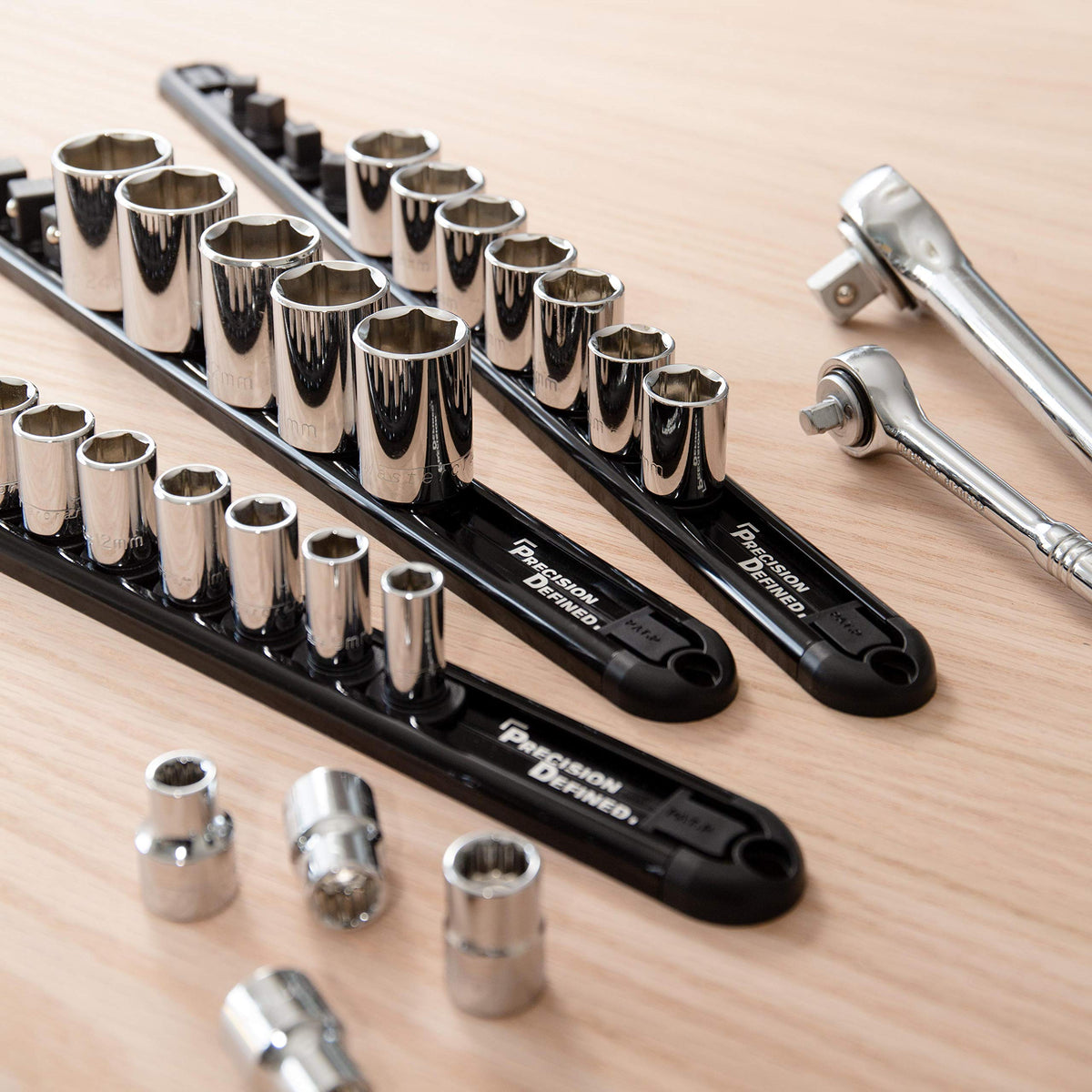 Precision Defined rail next to ruler showing compact sizing and storage capacity