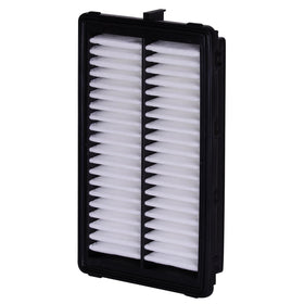 Mechanic fitting Premium Guard filter in workshop for fast replacement