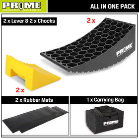 PR1ME levelers in use under RV tire on grass showing stability on soft ground