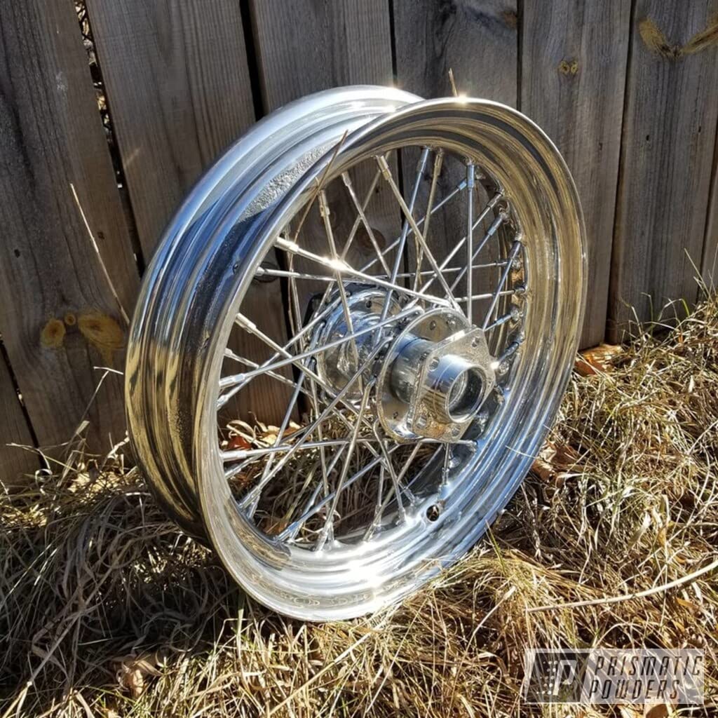 PRISMATIC POWDERS finished wheel demonstrating mirror-like shine benefit