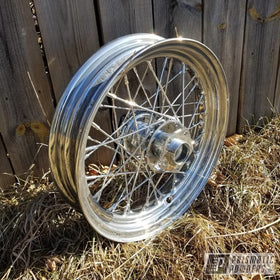 PRISMATIC POWDERS finished wheel demonstrating mirror-like shine benefit