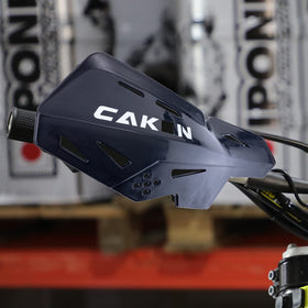 PRO CAKEN hand guard size comparison with ruler showing compact fit