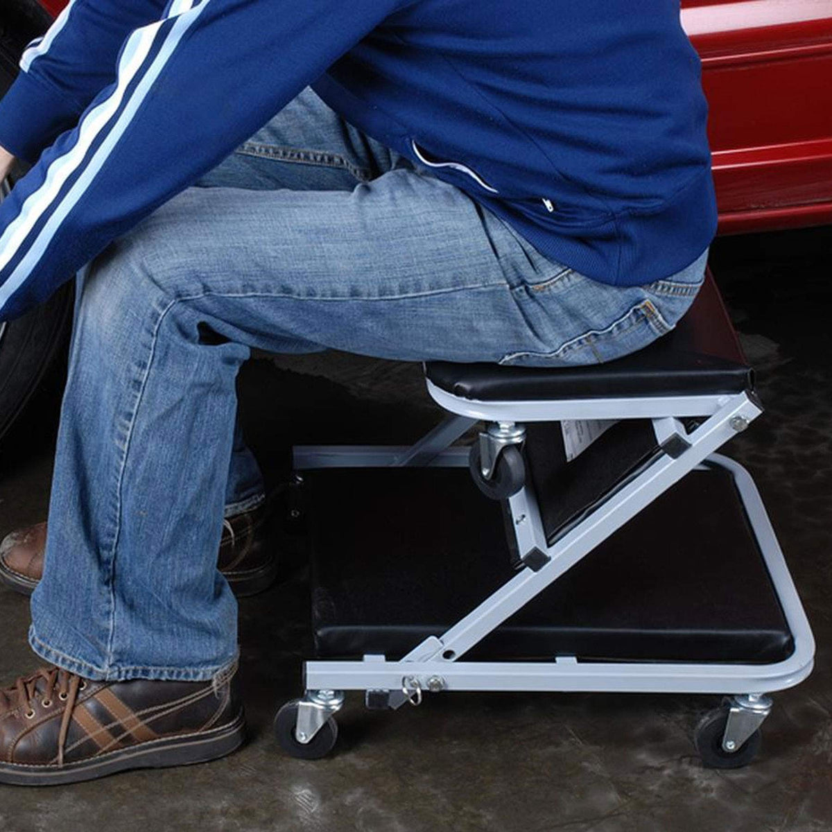 Pro-LifT unfolded creeper under car demonstrating mobility and access benefit
