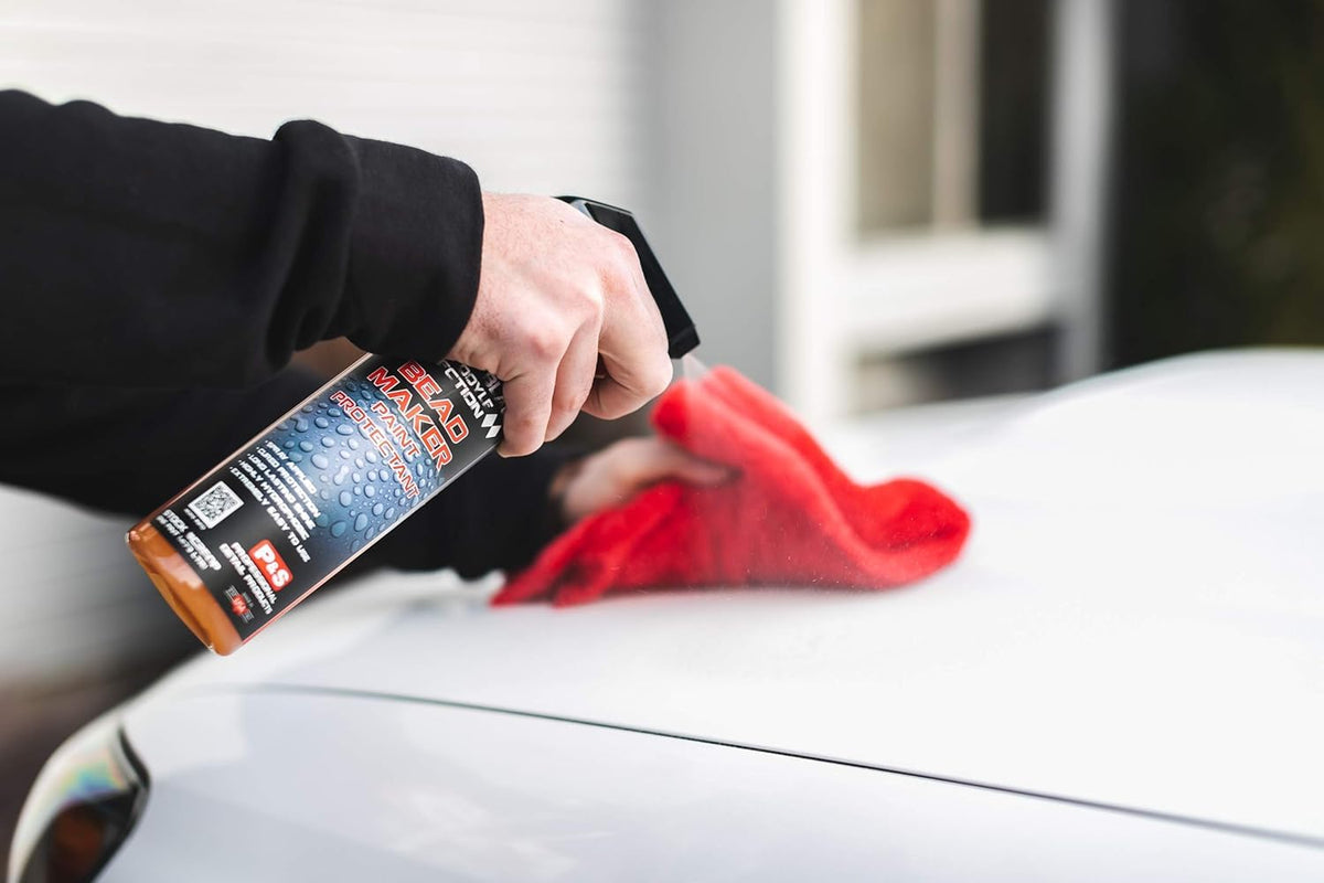 P & S PROFESSIONAL DETAIL PRODUCTS 16 oz bottle next to hand for size and scale
