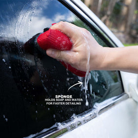 PUMBAA HOME sponge being used on car panel to remove road grime and restore gloss