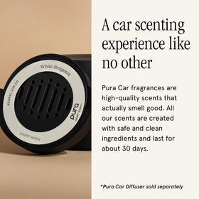 Pura Car diffuser on vehicle dashboard dispersing scent for a fresher commute