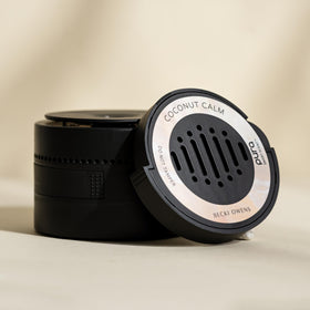 Pura Coconut Calm fragrance pouring detail illustrating long-lasting scent delivery