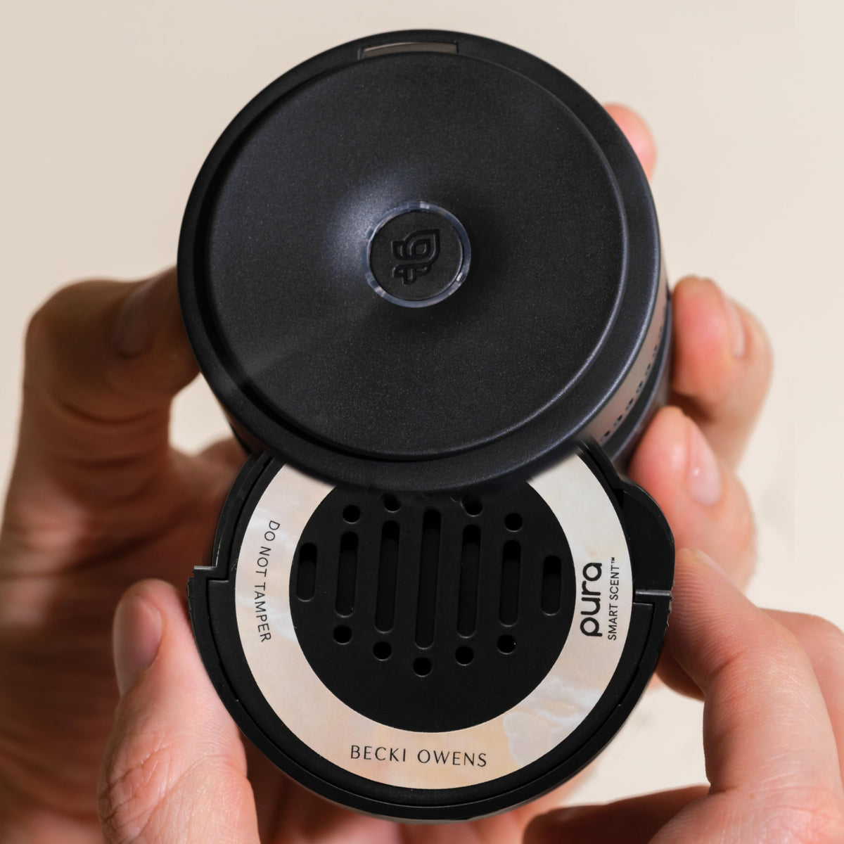 Pura Coconut Calm installed in car diffuser demonstrating motion-activated convenience