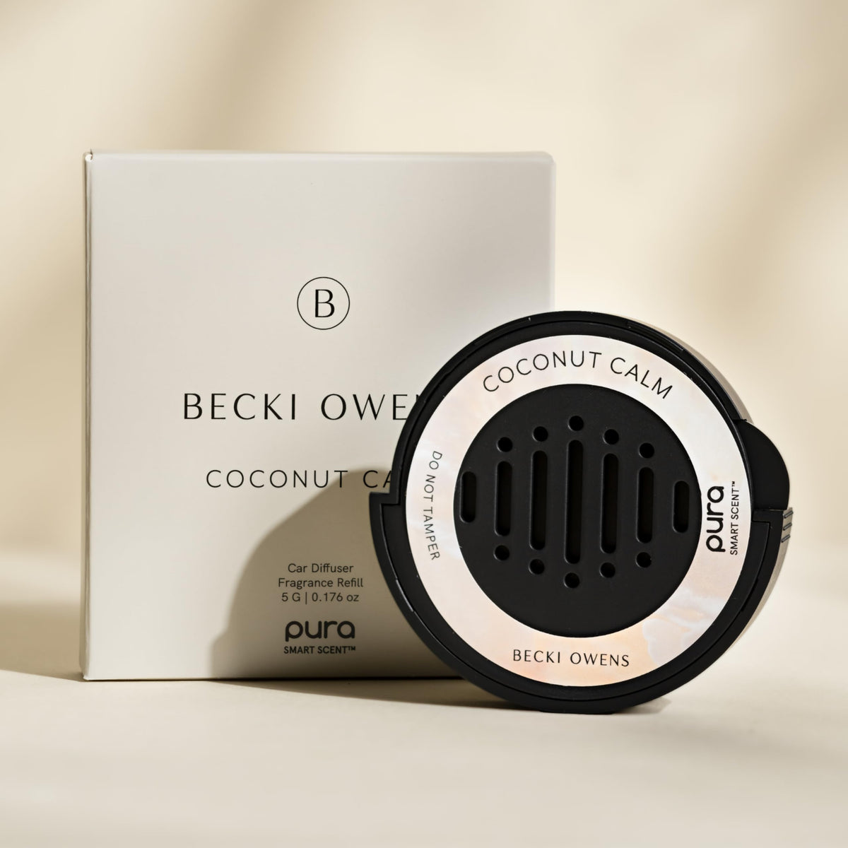 Pura Coconut Calm refill bottle close-up highlighting texture and safe formula
