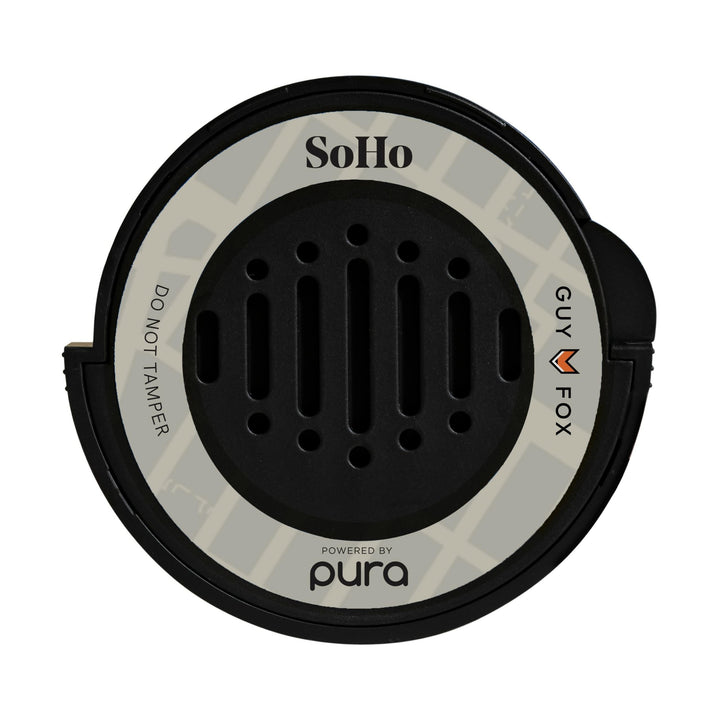 Pura & GUY FOX Soho refill front packaging showing fragrance name and design benefits