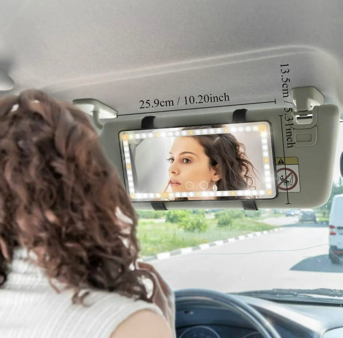 Purely Radiant mounted in SUV interior demonstrating hands-free grooming convenience