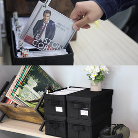 PUTNATRUE boxes styled on media shelf creating tidy display appeal