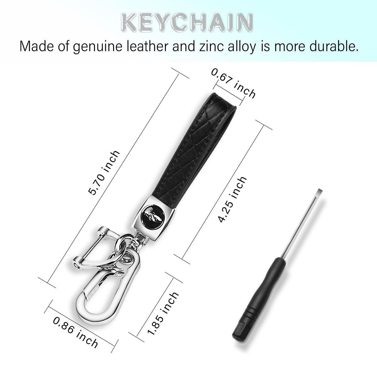 QBUC key fob cover next to coin for scale showing compact profile and pocket-fit