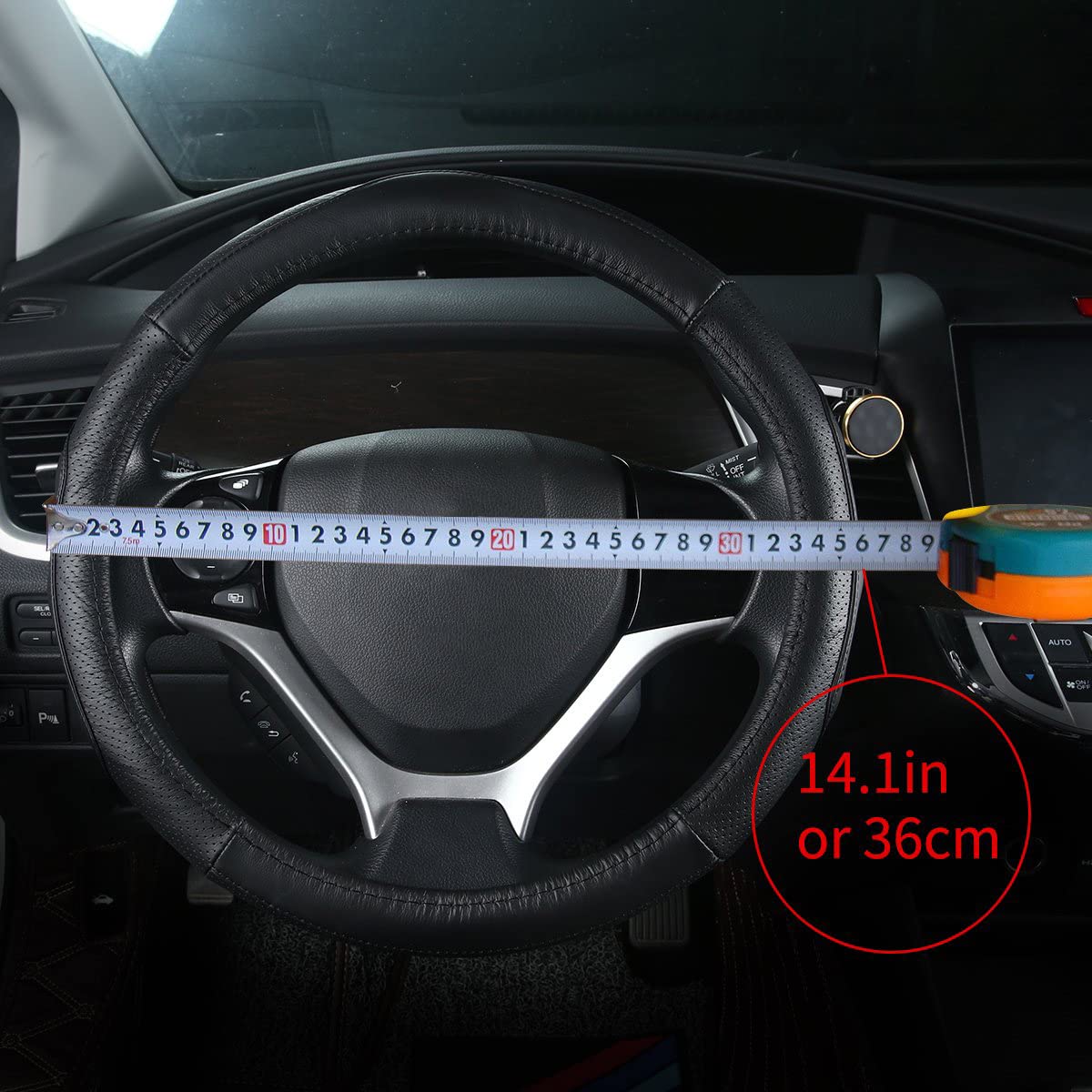 QianBao side view with ruler showing fit for 13.5 to 14.2 inch wheels