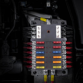Qidoe mounted on a boat dashboard demonstrating marine-ready splash resistance