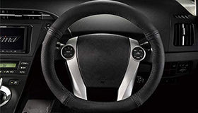 Qmety demonstrating D-shape fit and scale for Prius wheel compatibility