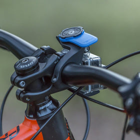 Quad Lock handlebar clamp detail showing secure fit and corrosion resistance