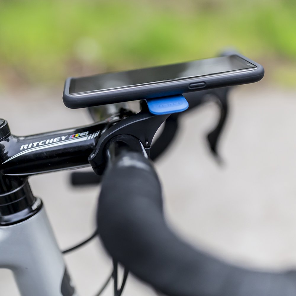 Quad Lock mount rotated over stem demonstrating forward phone positioning benefit