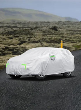 Qualencey car covered in snow demonstrating waterproof winter protection