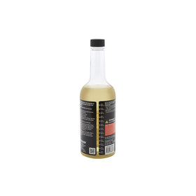 quicksilver bottle being poured with measuring cup for correct dosing
