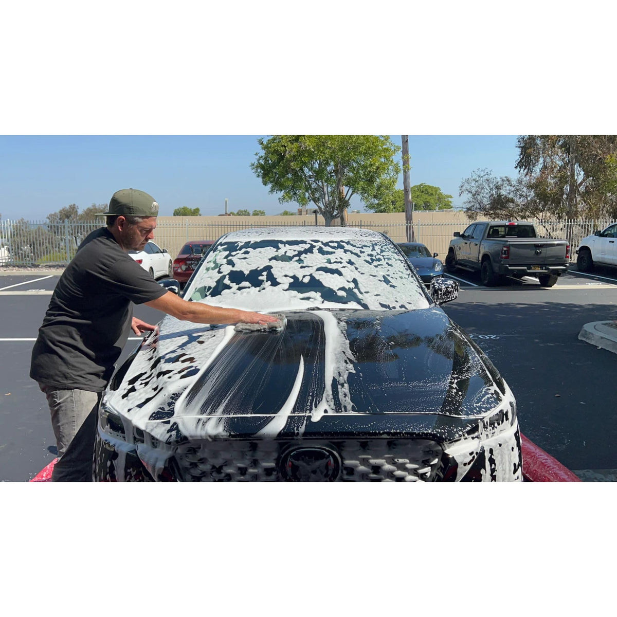 QUIVR foam applied to vehicle front fender demonstrating safe pre-wash