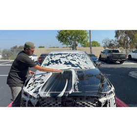 QUIVR foam applied to vehicle front fender demonstrating safe pre-wash