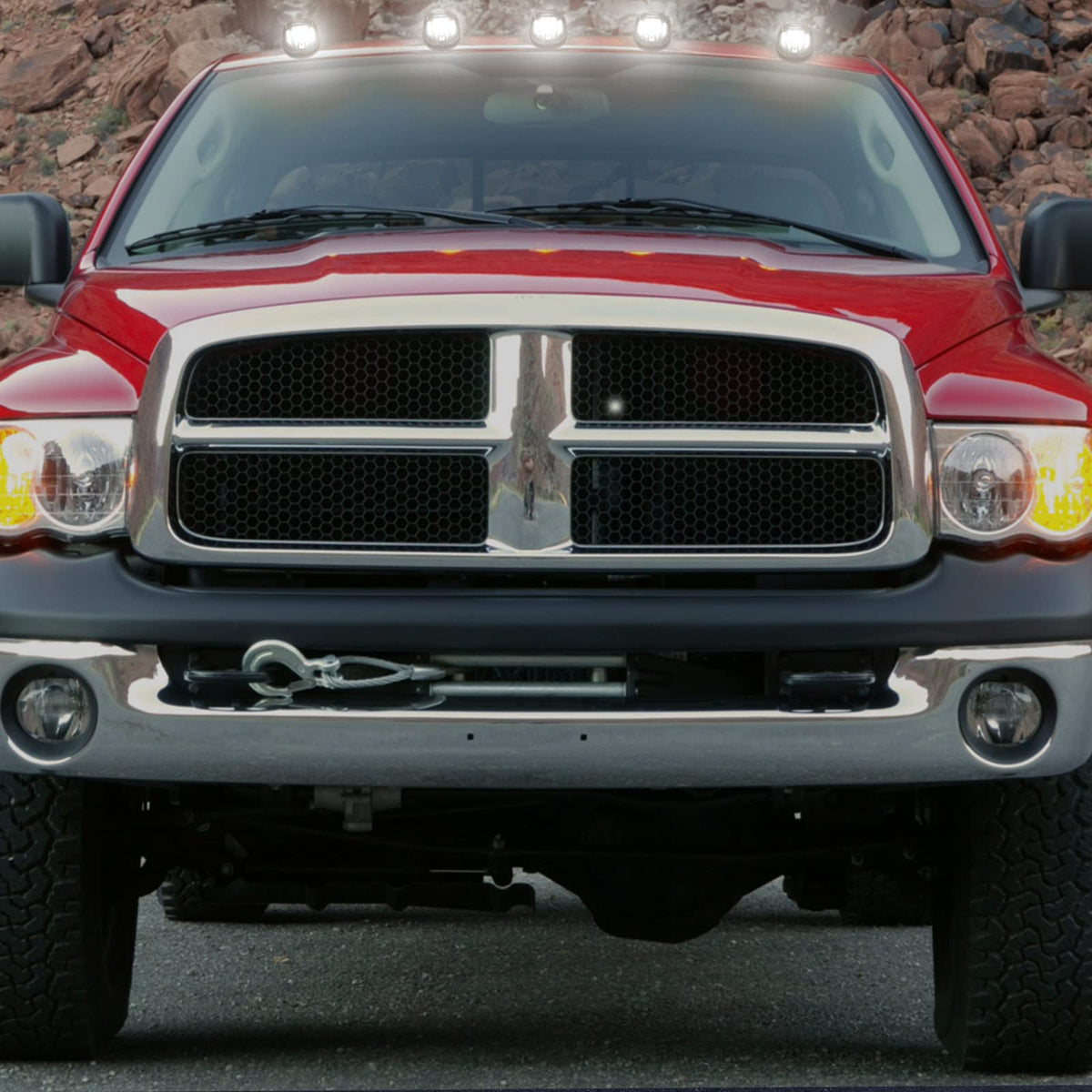 R&F Auto cab light next to ruler illustrating compact size and scale