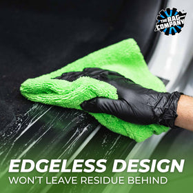 The Rag Company towel buffing vehicle hood for streak-free, glossy finish