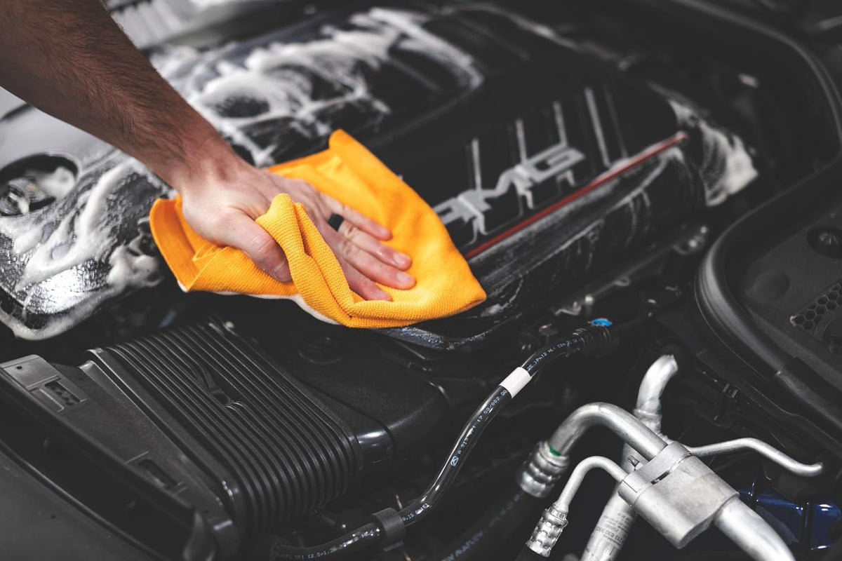 The Rag Company towel used on interior dash delivering lint-free polishing