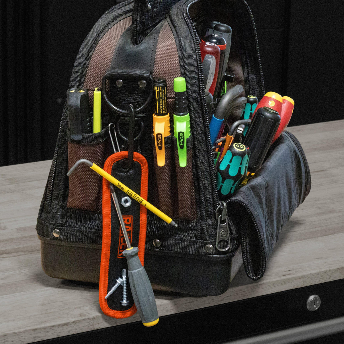 Railer mat clipped to belt with carabiner for hands-free portability