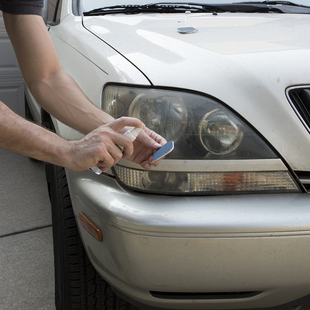 Rain‑X polishing cream being applied to lens showing restored shine benefit