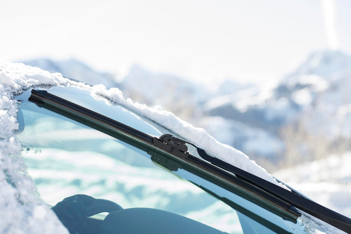 Rain-X blade installed on windshield clearing water for better visibility while driving