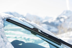 Rain-X blade installed on windshield clearing water for better visibility while driving