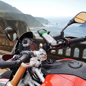 RAM MOUNTS phone mounted in X-Grip with ports accessible for easy charging