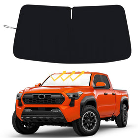 RAVOTOM front view on Tacoma showing full windshield protection and sun reduction