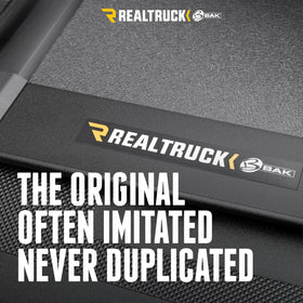 RealTruck BAKFlip MX4 tailgate seal detail showing improved weather protection benefit