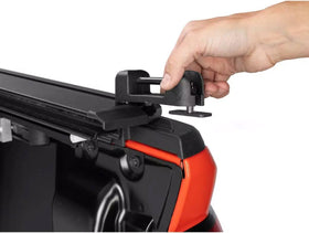 RealTruck Elevate cleat installed on T-slot rail with cargo strap showing secure load restraint