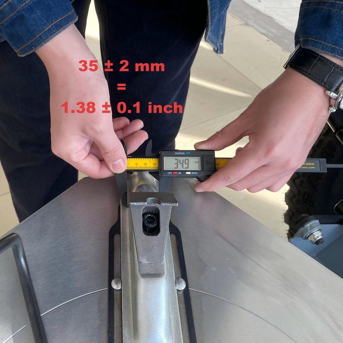 RebarTech spreader next to ruler showing compact, shop-friendly size