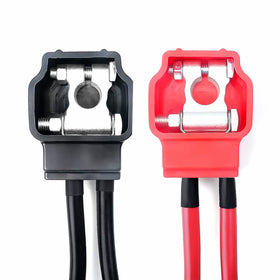 RECOIL clamps installed on a car battery top posts demonstrating stable, low-resistance contact