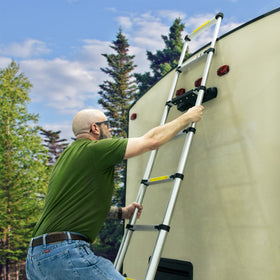 RecPro collapsed ladder beside travel bag illustrating compact storage