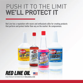 Red Line bottle on garage bench with tools showing professional-grade maintenance