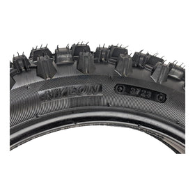 RedCap tire beside ruler illustrating 12-inch scale for accurate sizing