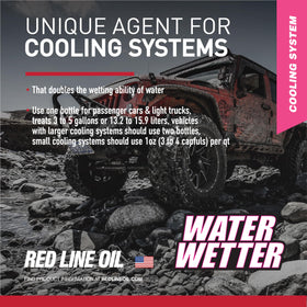 Red Line bottle positioned under hood showing compatibility and ease of installation