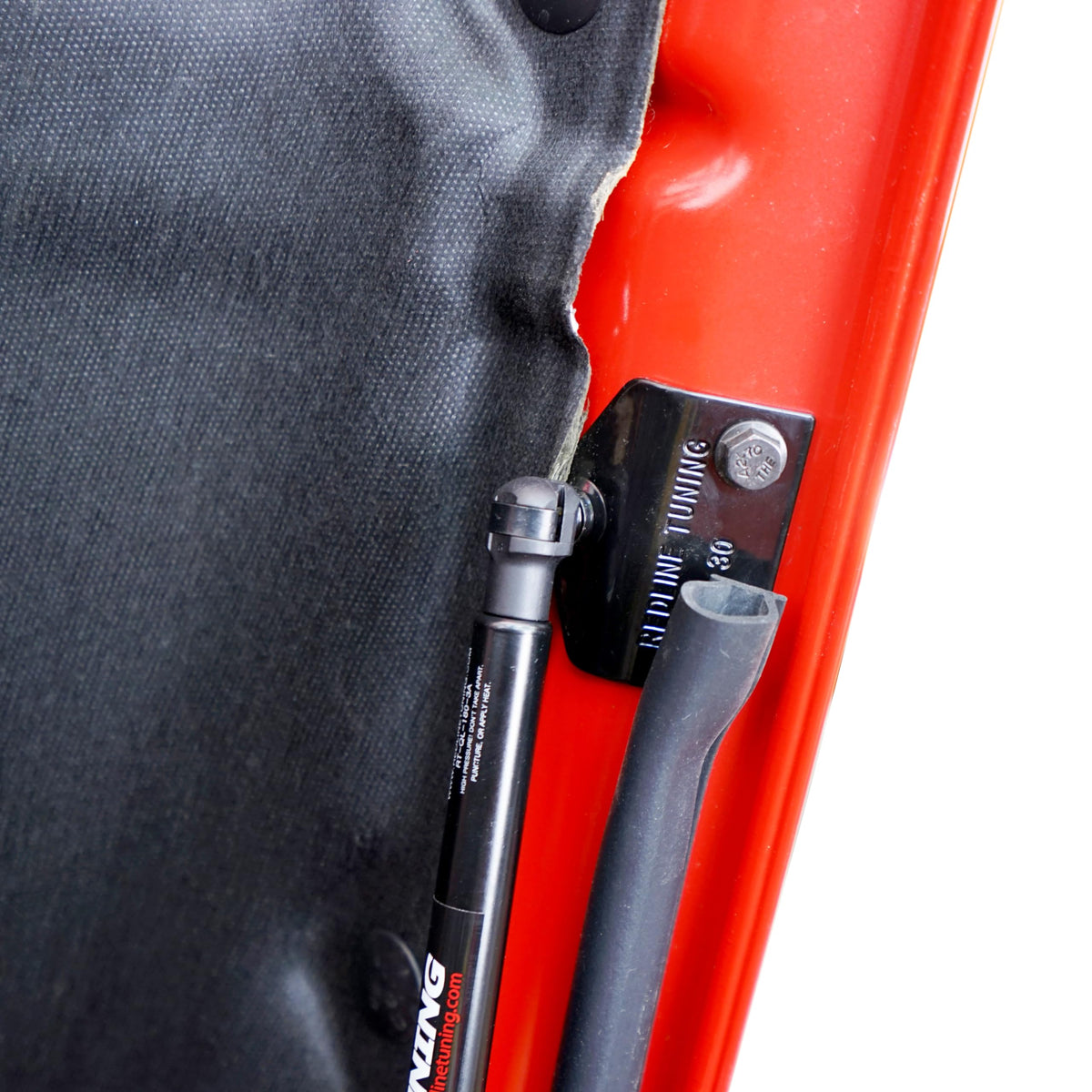 Redline Tuning installed on Jeep showing effortless hood opening benefit