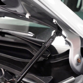 Redline Tuning installed on Tacoma with open hood demonstrating one-handed lift convenience