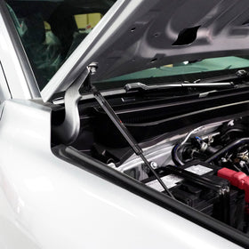 Redline Tuning lifestyle garage scene showing QuickLIFT aiding maintenance and convenience