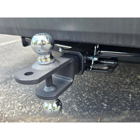 REDTEE hitch attached hauling small trailer showing real-world use