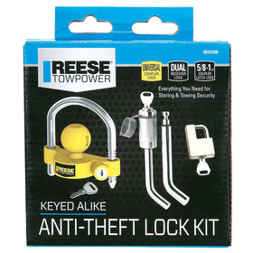 REESE lifestyle image of stored trailer with visible locks showing secure, deterred storage